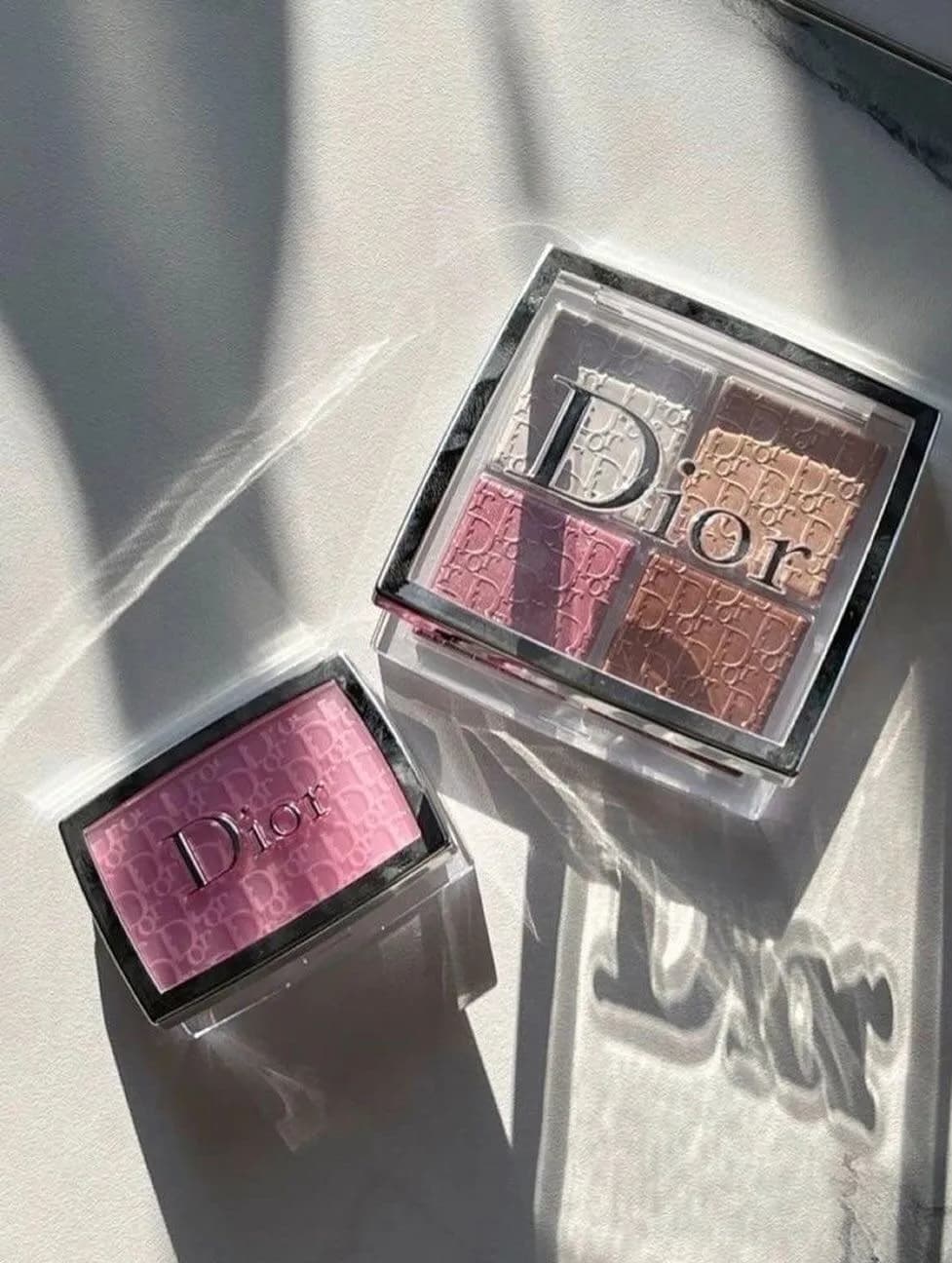 Designer backstage face palettes in sunlight